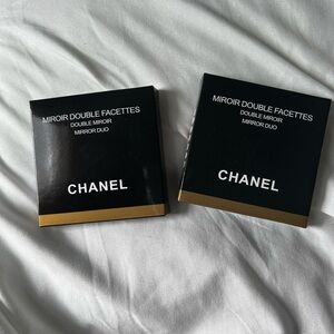 2 Chanel compacts. One black one teal/gren. NIB.